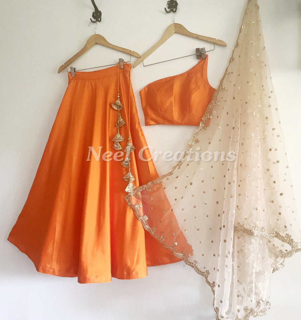 Lehnga blouse dupatta. Orange lehenga with gold dupatta stylish blouse. - Neel Creations By Saanvi