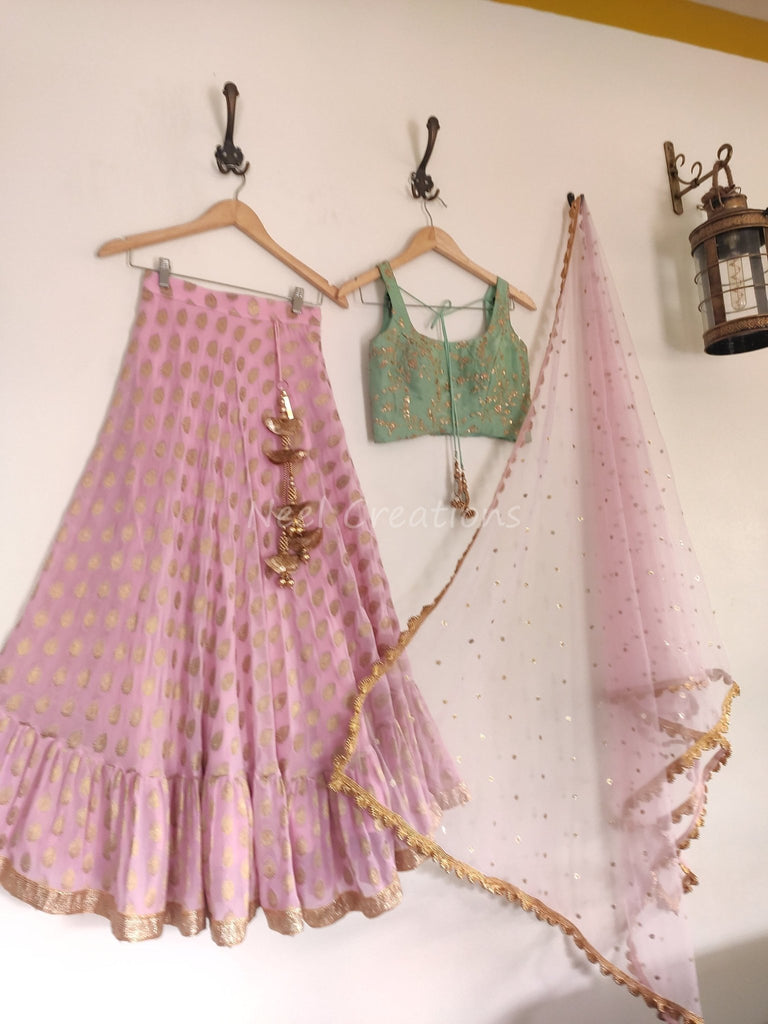 Pink lehenga with green embroidered blouse and pink net dupatta made to custom measure for women. Desiigner Indian partywear lengha choli - Neel Creations By Saanvi