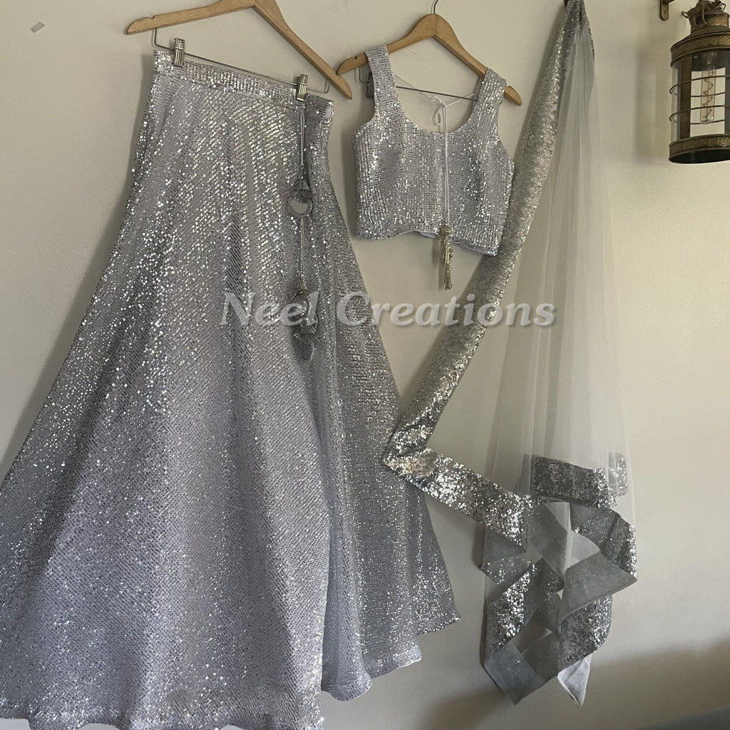 Silver Bling party wear lehenga skirt with stitched blouse and dupatta. Indian style wedding trousseau collection. - Neel Creations By Saanvi